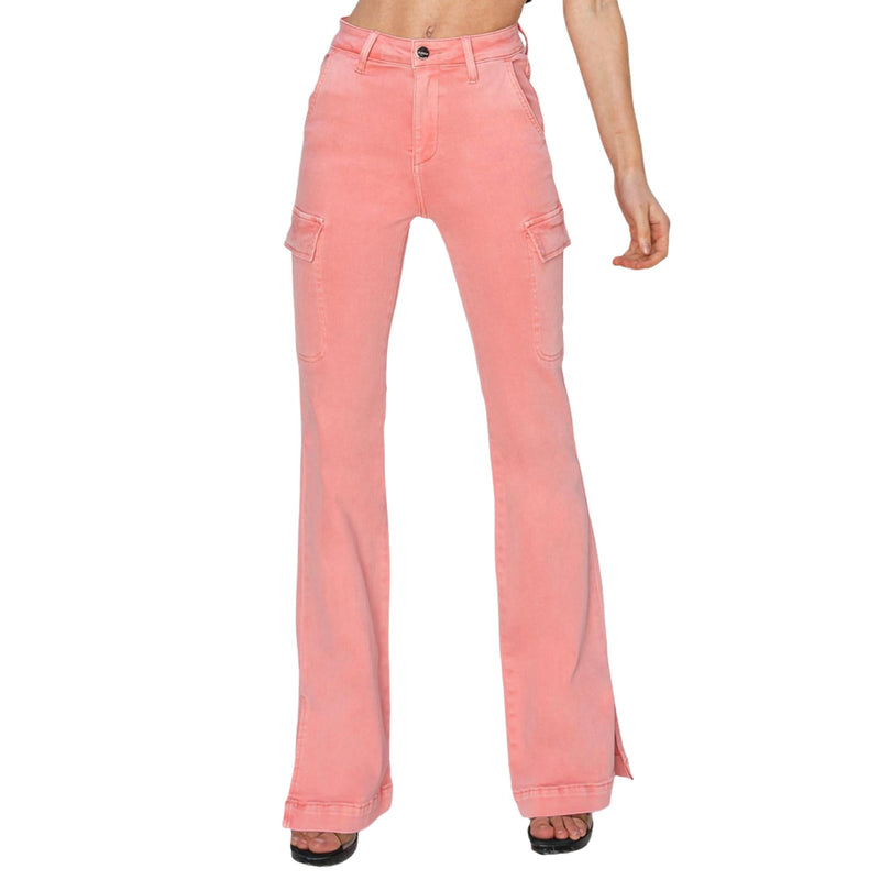 Load image into Gallery viewer,  Close-up front view of pink high-rise bootcut cargo jeans with cargo pockets and side slits.
