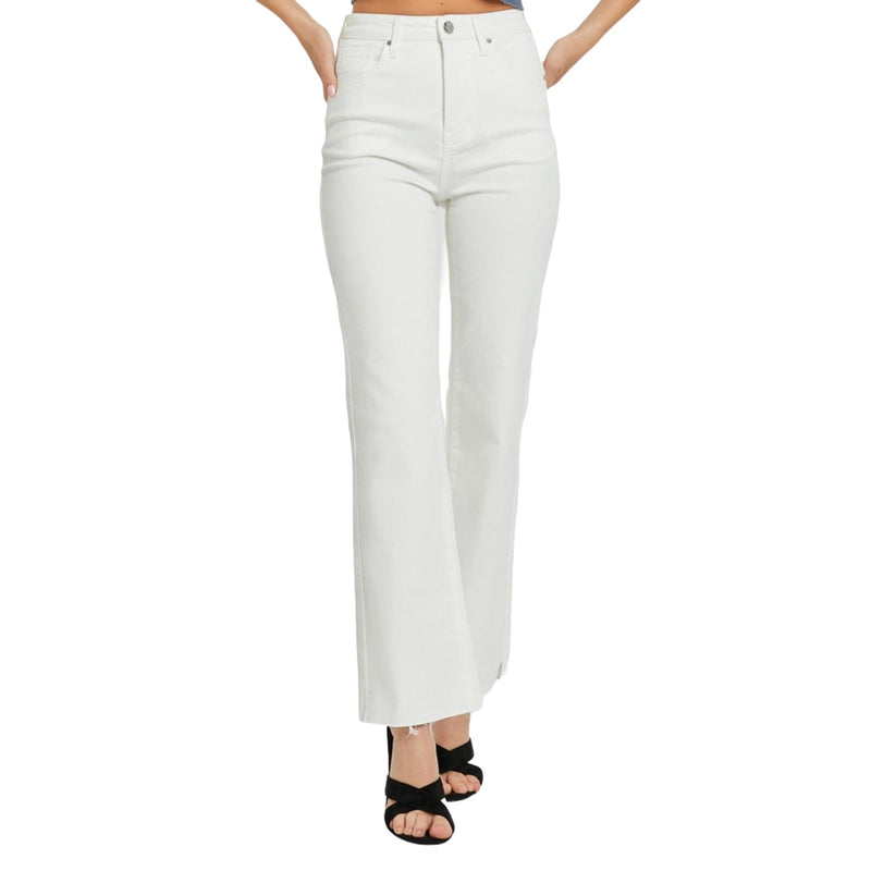 Load image into Gallery viewer, Full-length front view of high-rise white straight-leg jeans with a raw hem, paired with black sandals, emphasizing the sleek silhouette.
