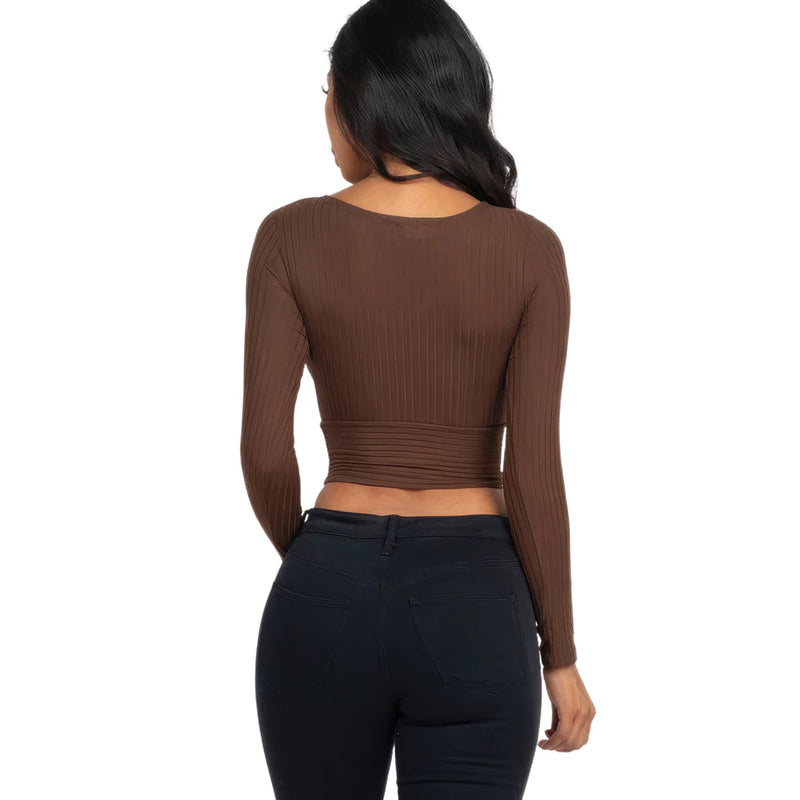 Load image into Gallery viewer, Back view of a woman wearing a Mocha Ribbed Wrap Front Long Sleeve Top, emphasizing the ribbed texture and fitted design.
