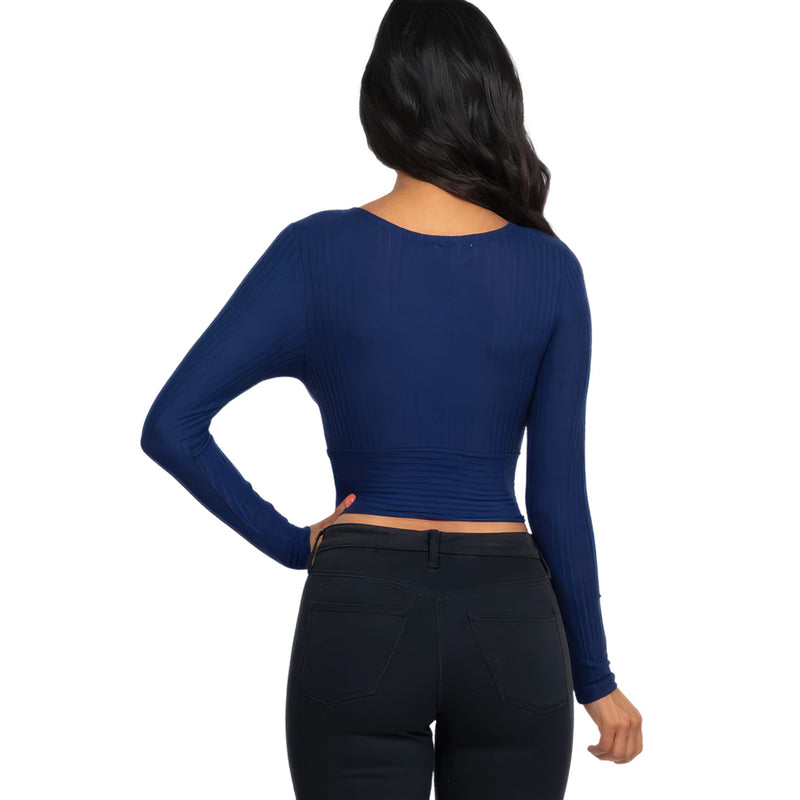 Load image into Gallery viewer, Rear view of a Navy Ribbed Wrap Front Long Sleeve Top on a woman, highlighting the figure-hugging silhouette and ribbed fabric.
