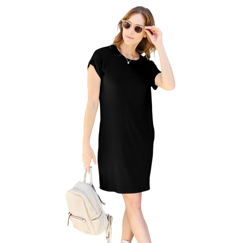 Load image into Gallery viewer, Woman wearing a black casual dress with a round neck and short sleeves, holding a light-colored woven backpack, styled with sunglasses
