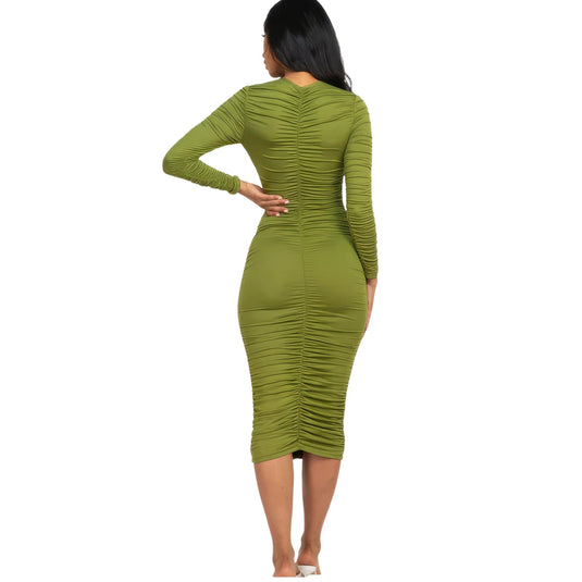 Back view of a woman in an olive green ruched midi dress, showcasing the detailed ruching and flattering fit.