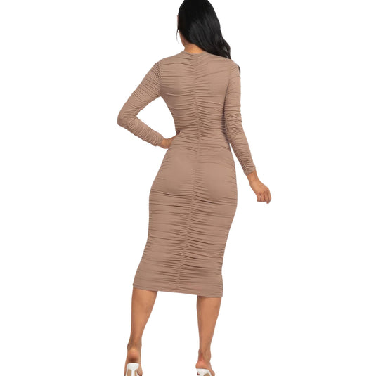 Rear perspective of a taupe grey ruched midi dress, highlighting the meticulous ruched details and the curve-complementing design.