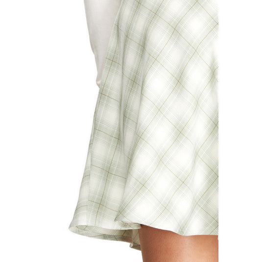 Close-up side view of a light green plaid mini skater skirt, focusing on the fabric's texture and pattern details.