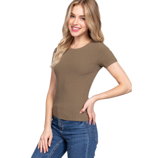 Trendy olive short sleeve rib knit top worn by a model, combining effortlessly with denim for a look that transitions smoothly from day to evening.