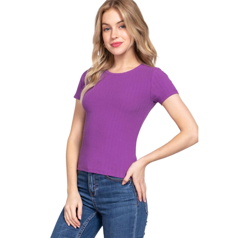 Load image into Gallery viewer, Bold purple rib knit top with a crew neck and short sleeves, presented on a cheerful model, making a statement with its rich color and snug fit.
