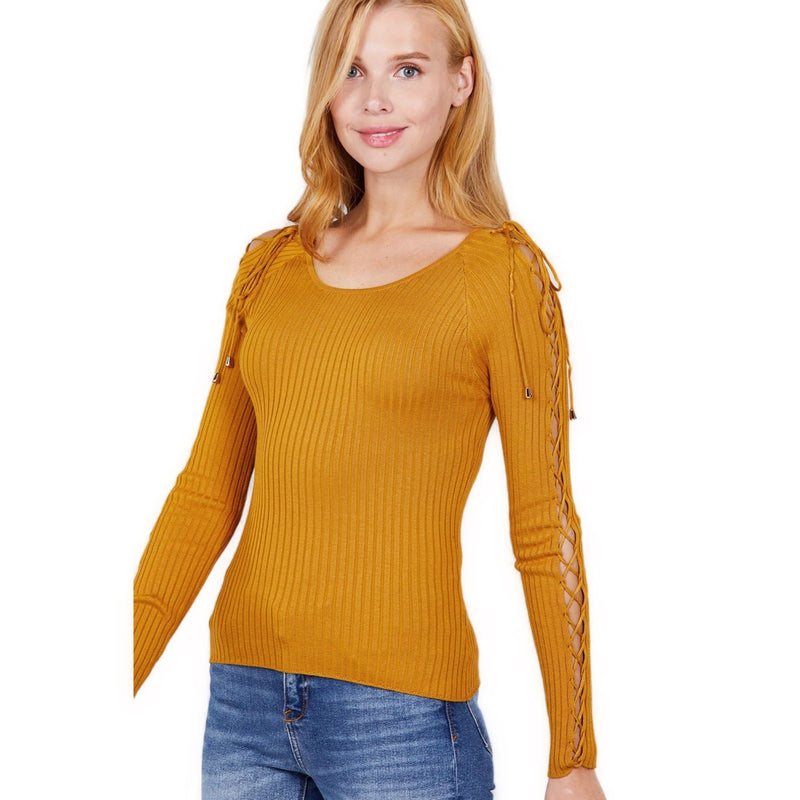 Load image into Gallery viewer, Portrait of a woman wearing a mustard ribbed sweater featuring eye-catching strappy sleeves, posed against a white background.
