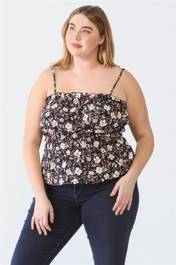 Plus-size model wearing a black floral frill cami top with adjustable spaghetti straps, styled with dark jeans.