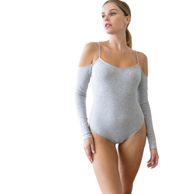 Model showcasing the Tasha Heather Grey Cold Shoulder Ribbed Bodysuit from the front, highlighting its form-fitting design, thin spaghetti straps, and trendy cold shoulder cut. Ideal for a sleek and fashionable outfit.