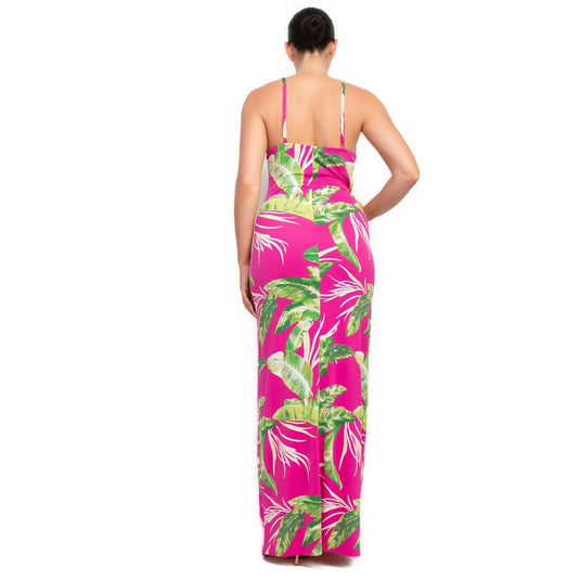 Back view of a fuchsia bodycon maxi dress with green tropical leaf print, perfect for summer parties and beach getaways.