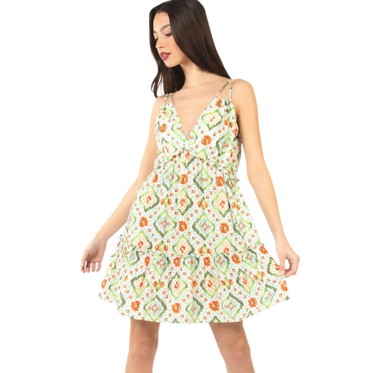 Front view of a woman wearing a Tunnel Detail Multi Color Printed Mini Dress with a deep V-neckline and adjustable spaghetti straps. The dress features a vibrant, playful pattern and ruffled hem, perfect for warm-weather occasions.