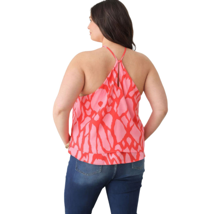 Rear view of a sleeveless halter top featuring an abstract red and pink design, displaying the elegant back tie.