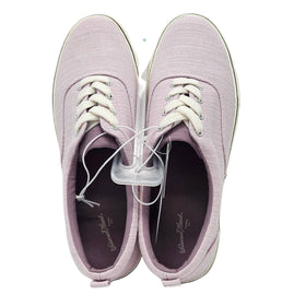 Close-up of women's light lavender vulcanized canvas sneakers by Universal Thread, featuring white laces and soft inner lining.