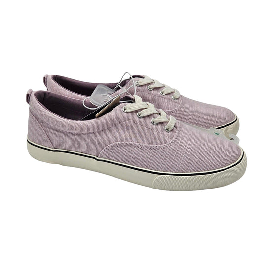 Side view of women's light lavender vulcanized canvas sneakers, showing the stylish and durable design.