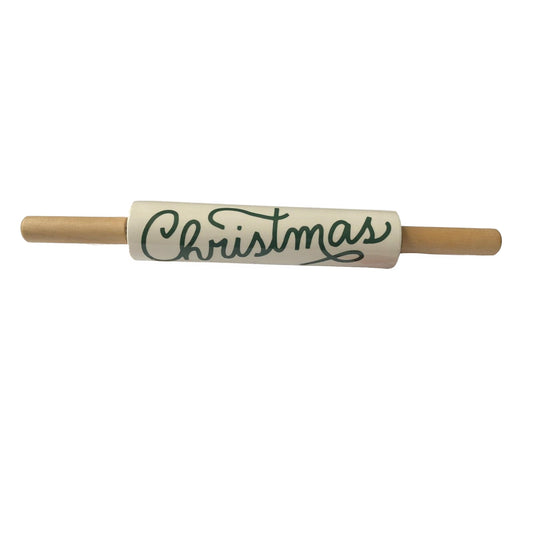 A stoneware rolling pin featuring 'Christmas' in elegant green script, complete with smooth wooden handles, perfect for seasonal kitchen decor.